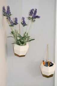 These cute easy hanging wall planters are perfect for succulents and pencils, too. They keep the clutter up off your desk for a harmonious space.